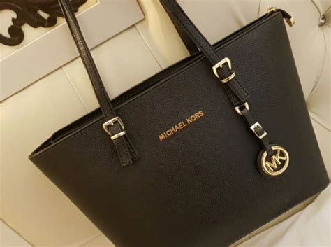 michael kors firmy mk torebka bialoczarna z paseczkami|Michael Kors official website.